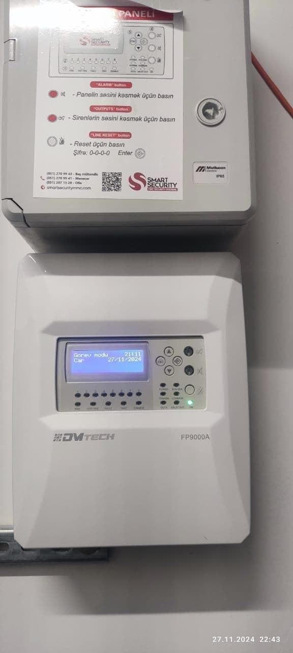 Divara quraşdırılmış DMTech yanğın siqnalizasiyası paneli